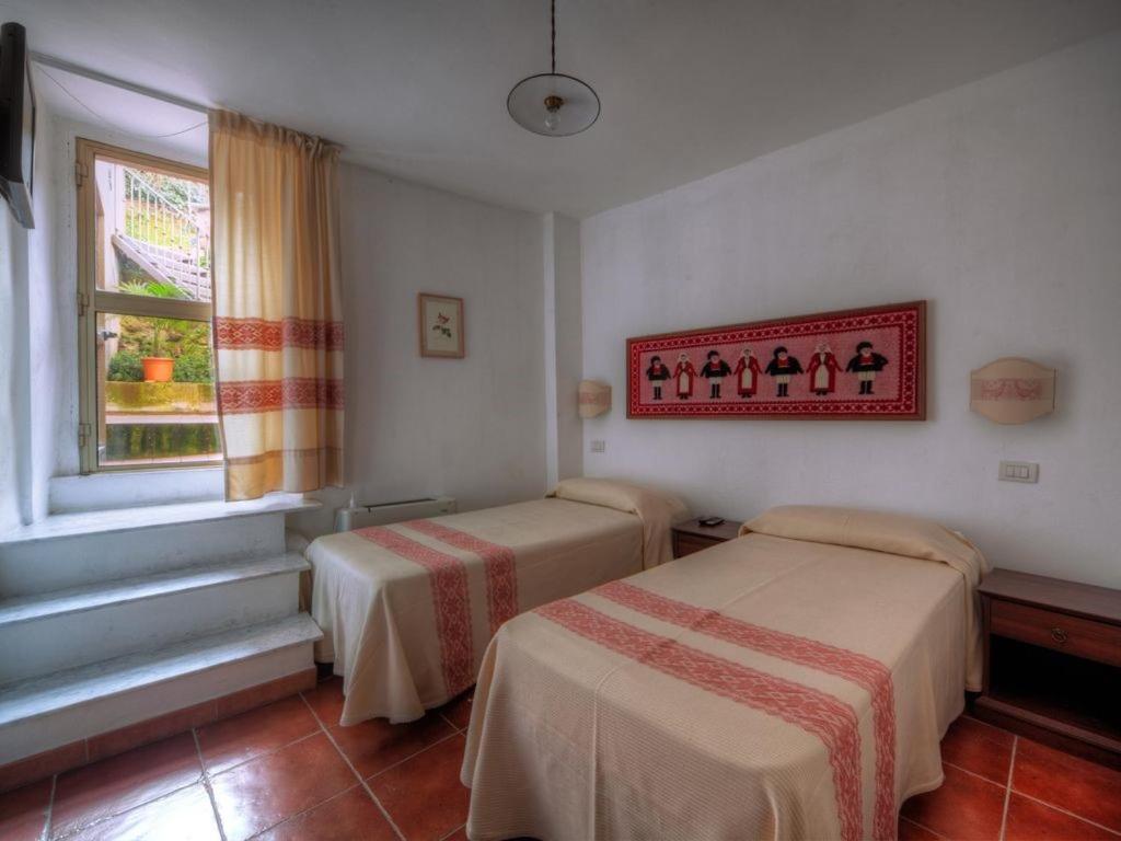 Affitta Camere Casa Delle Rose Villanova Monteleone Exterior photo